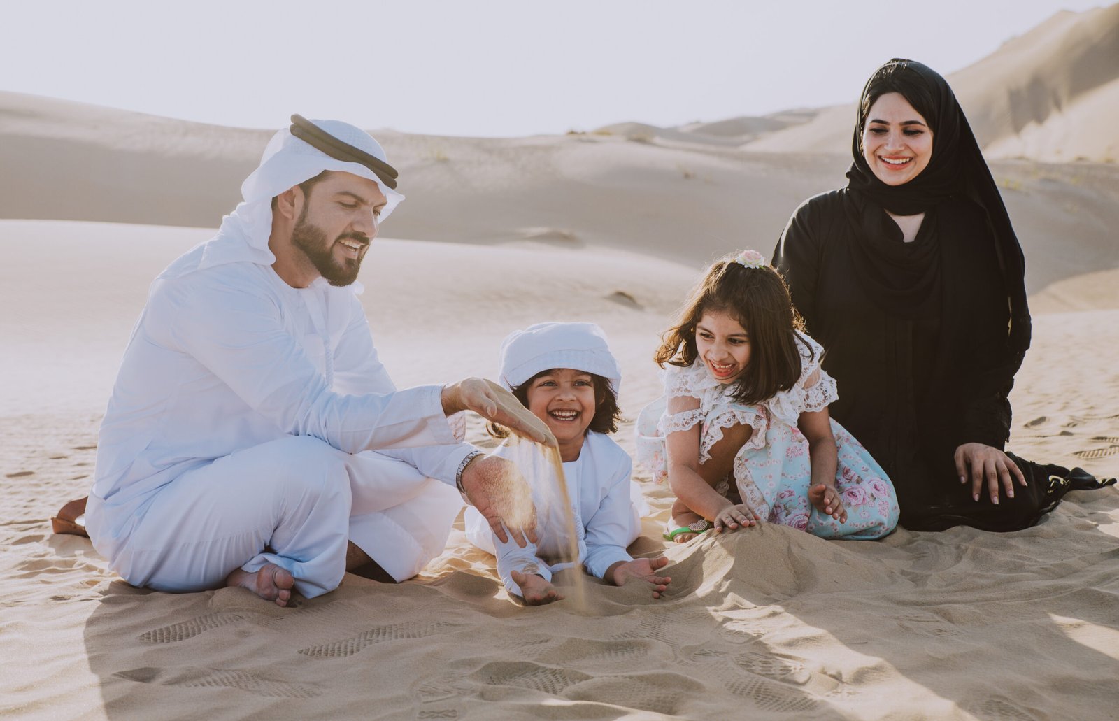happy family having fun in the desert